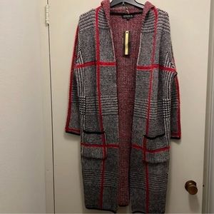 Mens cardigan sweater or for ladies as well.  Red, black and white checkered